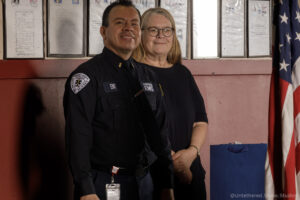 EMT Manuel Perlera stands with Alexandra Williams at a recent Academy graduation.