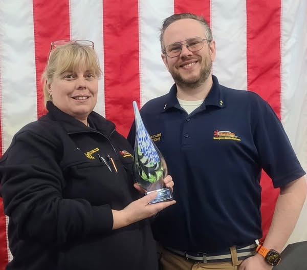 Captain Sue Legris, left, received the Daniel J. Minerva Founders Award for 25 years of service with Empress.