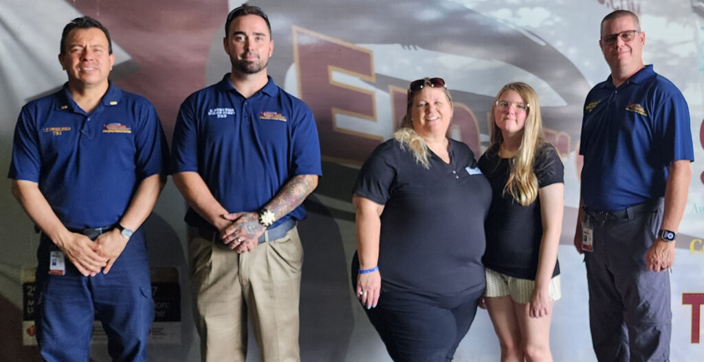 Empress staff pose with Dawn Witherspoon and her daughter Allison, founders of the For Paul Foundation.
