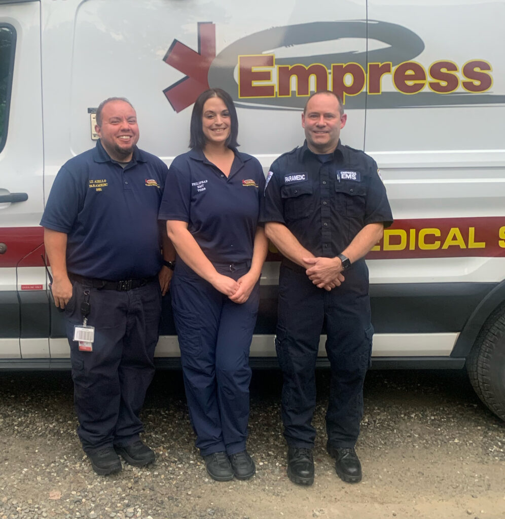 Lt. Chris Aiello with h EMT Hilary Philipbar and Paramedic Jason Dorn EOM August