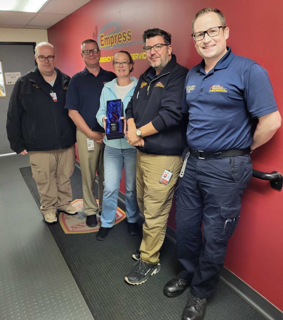 Shelly Taber gets 10-year award with Mark Browne Deputy Chief Scott Holland Deputy Chief Bob Szeli and Captain Paul Mellamphy